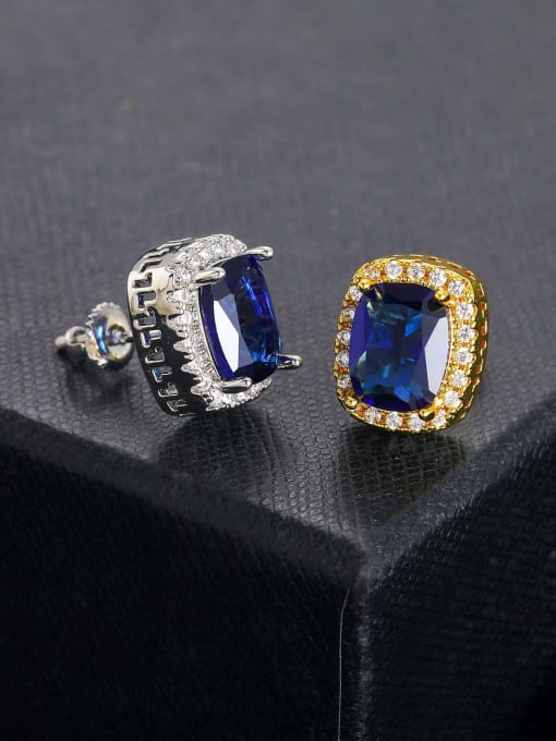 A pair of sapphire and gold Brass Cubic Zirconia Geometric Trend Stud Earring