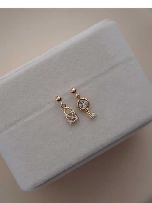 A pair of gold (including earplugs) 925 Sterling Silver Cubic Zirconia Key Dainty Stud Earring