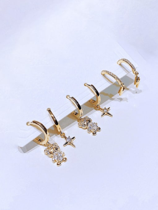 Ming Brass Cubic Zirconia Bear Cross Trend Huggie Earring 1