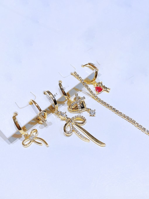 Ming Brass Cubic Zirconia Bowknot Tassel Vintage Huggie Earring 1