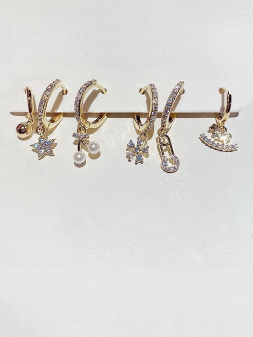 Ming Brass Cubic Zirconia Star Minimalist Huggie Earring 1