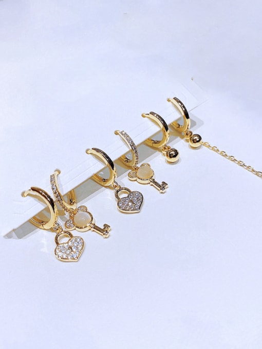 Ming Brass Cubic Zirconia Geometric Minimalist Huggie Earring 1