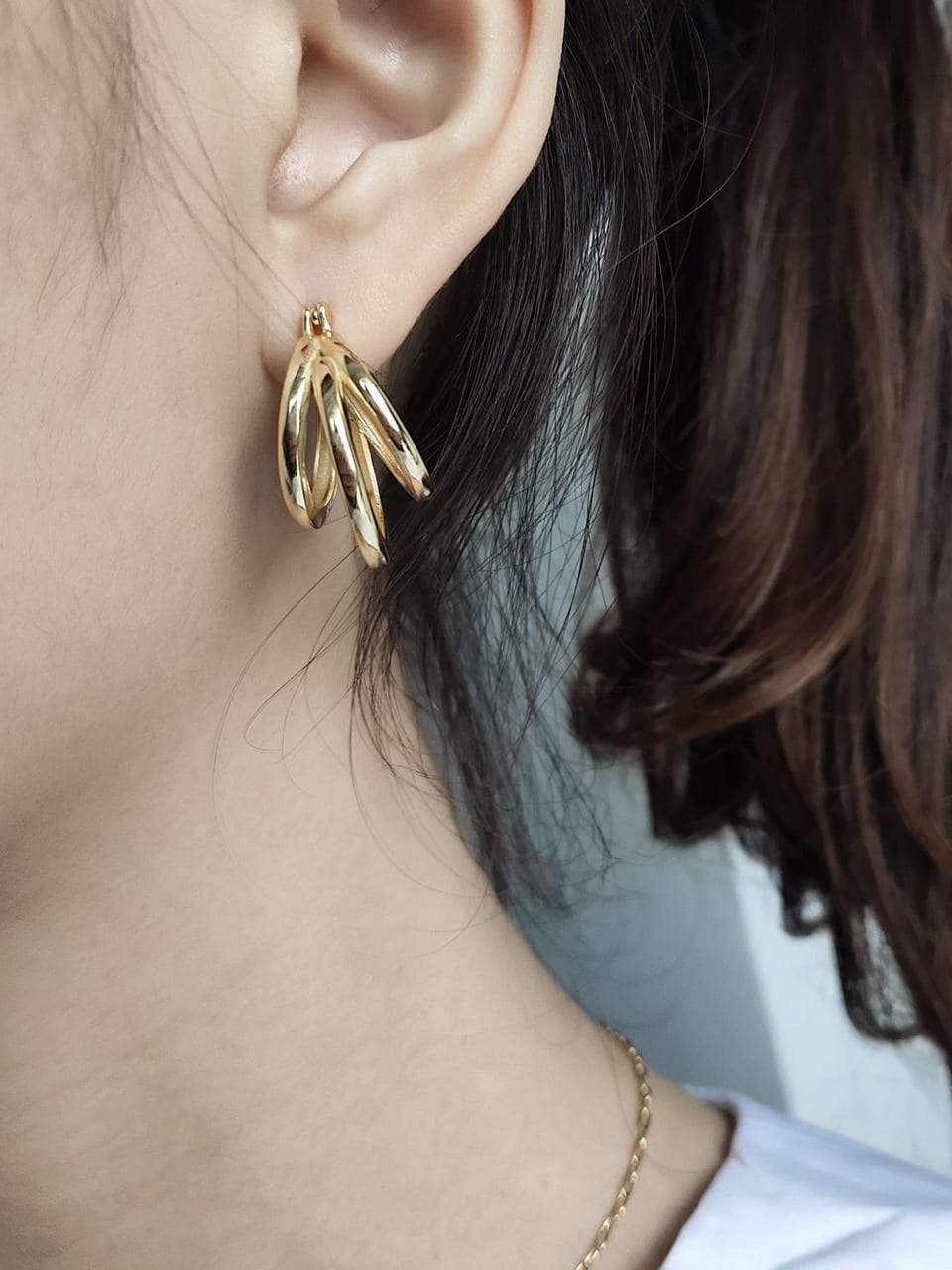 Three 2025 hoop earrings